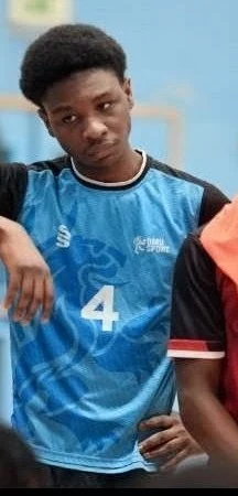 Fhaeeq in a DMU Sport football shirt, number 4